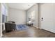 Inviting entryway with wood-look tile, bench seating, and a cozy atmosphere at 5245 N 205Th Ln, Buckeye, AZ 85396