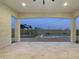 Covered patio showing pool, pergola and string lights with pavers at 5245 N 205Th Ln, Buckeye, AZ 85396