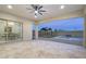 Entertainer's covered patio with pool, pergola and string lights adjoins a dining room at 5245 N 205Th Ln, Buckeye, AZ 85396