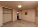 Neutral bedroom with carpet, closet and view into the bathroom at 5301 W Vernon Ave, Phoenix, AZ 85035