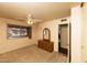 Cozy bedroom features ceiling fan and vanity with an oval mirror at 5301 W Vernon Ave, Phoenix, AZ 85035