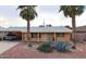 Single story home with easy care front yard, covered parking and desert landscaping at 5301 W Vernon Ave, Phoenix, AZ 85035