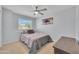 Cozy bedroom with neutral color walls and ceiling fan at 5611 W Blackhawk Dr, Glendale, AZ 85308