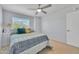 Cozy bedroom with neutral color walls and ceiling fan at 5611 W Blackhawk Dr, Glendale, AZ 85308