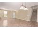 Warm living room with a tiled floor and staircase at 6755 S Tucana Ln, Gilbert, AZ 85298