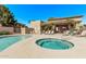 Community pool and jacuzzi offer resort-style living with lounge seating at 705 W Queen Creek Rd # 1154, Chandler, AZ 85248