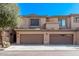 Two-story home featuring a spacious two-car garage and desert landscaping at 705 W Queen Creek Rd # 1154, Chandler, AZ 85248