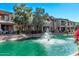 Community waterfront with fountain, trees, and well-maintained landscaping at 705 W Queen Creek Rd # 1154, Chandler, AZ 85248