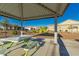 Community playground with picnic tables, slide and swings providing a fun recreational area for families at 8025 W Gardenia Ave, Glendale, AZ 85303