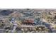 Aerial view of community center with desert surroundings, trails, and landscaped walkways at 8857 S 167Th Ln, Goodyear, AZ 85338