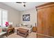 Cozy living room featuring a comfortable sectional couch, accent tables and carpet at 8857 S 167Th Ln, Goodyear, AZ 85338