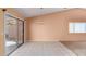 Dining area with tile floors and sliding glass doors leading to backyard at 10792 W Elm Ln, Avondale, AZ 85323