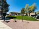 Exterior view of a residential building with landscaping and parking at 1335 E June St # 113, Mesa, AZ 85203