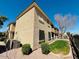 Exterior of the home showing a landscaped yard and a view of the building at 1335 E June St # 113, Mesa, AZ 85203