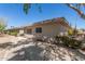 Street view of a well-maintained single-story home with desert landscaping and a sidewalk at 13628 N 109Th Ave, Sun City, AZ 85351