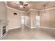 Open-concept living room featuring tile floors, recessed lighting, and neutral paint colors at 13628 N 109Th Ave, Sun City, AZ 85351