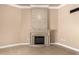 Living room featuring a fireplace with an elegant mantel and decorative tile surround at 13628 N 109Th Ave, Sun City, AZ 85351