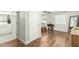 Bedroom featuring ceiling fan, wood flooring, and sewing machine desk at 14027 N 32Nd St, Phoenix, AZ 85032