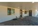 Covered entrance featuring two doors and gray paver flooring at 14027 N 32Nd St, Phoenix, AZ 85032