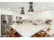 Bright eat-in kitchen featuring a large center island and stainless steel appliances at 14027 N 32Nd St, Phoenix, AZ 85032