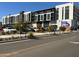 Mixed-use building featuring retail shops and apartments with a modern facade and street appeal at 14027 N 32Nd St, Phoenix, AZ 85032