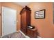 Hallway featuring linen closet, complemented by stylish rug and a printer at 16017 W Wildflower Dr, Surprise, AZ 85374