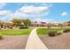 Community playground featuring play structures and well-maintained green space at 17532 W Caribbean Ln, Surprise, AZ 85388