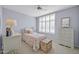 Charming bedroom with plantation shutters, soft carpet, and stylish furniture at 18254 N 136Th Ave, Sun City West, AZ 85375