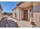 Charming front porch with secure screen door, outdoor seating, and low maintenance landscaping at 18254 N 136Th Ave, Sun City West, AZ 85375