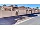 Spacious detached garages with matching walls and roof, providing ample parking in a neighborhood at 18254 N 136Th Ave, Sun City West, AZ 85375