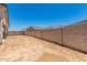 Backyard features a block fence at 18363 W Monte Lindo Ln, Surprise, AZ 85387