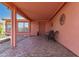 Inviting covered front porch with desert decor, perfect for relaxing and enjoying the outdoors at 2101 S Meridian Rd # 60, Apache Junction, AZ 85120