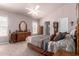 Spacious main bedroom with vaulted ceiling, ceiling fan, and coordinating furniture set at 2101 S Meridian Rd # 60, Apache Junction, AZ 85120