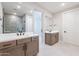 Bathroom featuring dual vanities, modern fixtures, and tile flooring at 2121 W Sonoran Desert Dr # 47, Phoenix, AZ 85085