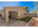 The backyard has a covered patio, rock landscaping, and turf at 2242 W Calle Marita --, Phoenix, AZ 85085