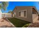 Exterior side view of house featuring backyard and patio at 2242 W Calle Marita --, Phoenix, AZ 85085