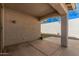 Covered patio featuring a concrete floor and low maintenance yard at 2242 W Calle Marita --, Phoenix, AZ 85085