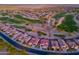 Community aerial view features houses, golf course, and desert landscape at 2369 E Fiesta Dr, Casa Grande, AZ 85194
