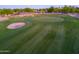 Golf course with manicured greens, sand traps, and lush fairways, perfect for active lifestyle at 2369 E Fiesta Dr, Casa Grande, AZ 85194
