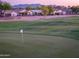 Scenic golf course view with lush green fairway and nearby residential homes at 2369 E Fiesta Dr, Casa Grande, AZ 85194