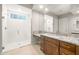 Bathroom with white subway tile shower and granite countertops at 26650 W Siesta Ln, Buckeye, AZ 85396