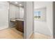 Bathroom featuring vanity, granite countertop, and a seamless glass shower at 26650 W Siesta Ln, Buckeye, AZ 85396
