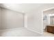 Neutral bedroom with carpet and an ensuite bathroom has privacy and comfort at 26650 W Siesta Ln, Buckeye, AZ 85396