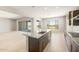 Spacious kitchen with granite counters, stainless appliances, and large windows for natural light at 26650 W Siesta Ln, Buckeye, AZ 85396