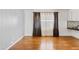 A dining room featuring hardwood floors and large windows at 2700 E Allred Ave # B20, Mesa, AZ 85204