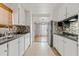 Well-lit kitchen with tiled floor, stainless steel appliances, and generous counter space at 2700 E Allred Ave # B20, Mesa, AZ 85204