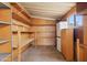 Storage area with shelving and cabinets, providing lots of room for storage at 2700 E Allred Ave # B20, Mesa, AZ 85204