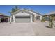 Charming single-story home with a two-car garage and low-maintenance desert landscaping at 2778 E Devon Ct, Gilbert, AZ 85296