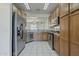 Galley kitchen featuring stainless steel appliances and wood cabinets at 2778 E Devon Ct, Gilbert, AZ 85296