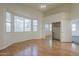 Spacious main bedroom with wood floors and a large bay window with lots of natural light at 2778 E Devon Ct, Gilbert, AZ 85296